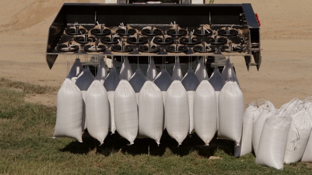 Mechanical Sandbag Filling, Flood Control Sandbags | Barrier Systems, LLC